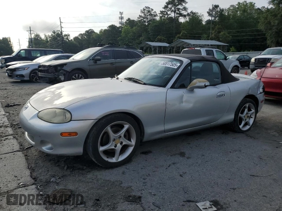 2003 Mazda MX-5 Miata Cloth z VIN JM1NB353630305964, wystawiony jako Copart lot #58517505 z przebiegiem 129 675 mil mil oraz Szkoda całkowita • Salvage title. Historia ofert i sprzedaży dostępna na DreamBid. Obrazek 1.