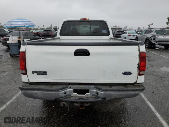 2003 Ford F-350 XL with VIN 1FTSW30F63EB07672, listed as a Copart auction lot 44244575 with 243,624 mi miles and Salvage Title. Bid and sale history available at DreamBid. Image 6.