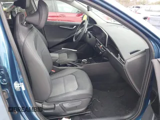 2023 Kia Niro Wind with VIN KNDCR3L15P5014997, listed as a IAAI auction lot 41525672 with 12,499 mi miles and . Bid and sale history available at DreamBid. Image 5.