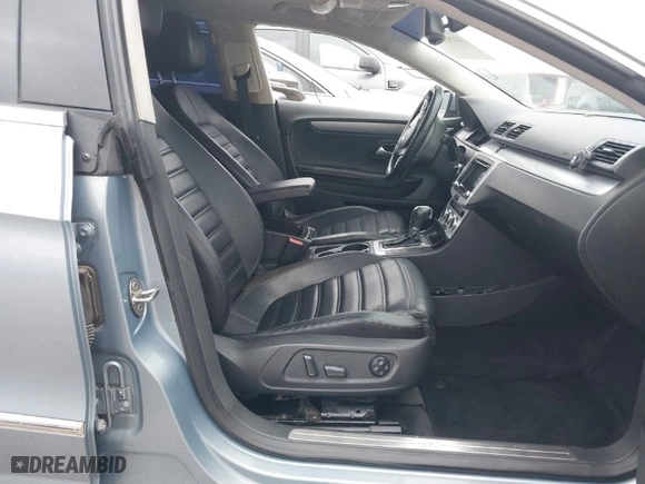2013 Volkswagen CC Sport with VIN WVWBN7AN7DE503417, listed as a IAAI auction lot 41205584 with 185,437 mi miles. Bid and sale history available at carsss.com. Image 5.