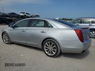 2016 Cadillac XTS Luxury Collection z VIN 2G61M5S30G9104763, wystawiony jako Copart lot #56464505 z przebiegiem 54 309 mil mil oraz Szkoda całkowita • Salvage title. Historia ofert i sprzedaży dostępna na DreamBid. Obrazek 2.