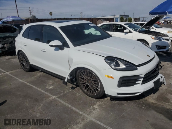 2021 Porsche Cayenne with VIN WP1AA2AYXMDA00148, listed as a Copart auction lot 52647565 with 27,977 mi miles and Salvage title. Bid and sale history available at DreamBid. Image 4.