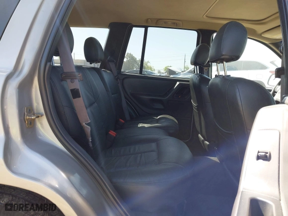 2001 Jeep Grand Cherokee Laredo with VIN 1J4GW48S61C662315, listed as a IAAI auction lot 42002235 with 166,901 mi miles. Bid and sale history available at carsss.com. Image 8.