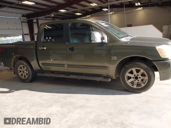2004 Nissan Titan LE with VIN 1N6AA07A74N524414, listed as a IAAI auction lot 39769313 with 299,250 mi miles and . Bid and sale history available at DreamBid. Image 13.