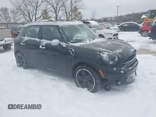 2016 MINI Countryman S with VIN WMWZC3C56GWT11105, listed as a IAAI auction lot 41228246 with 102,971 mi miles and . Bid and sale history available at DreamBid. Image 1.