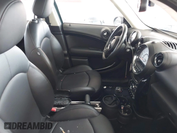 2013 MINI Countryman S with VIN WMWZC3C56DWP24170, listed as a IAAI auction lot 42366594 with 143,311 mi miles and . Bid and sale history available at DreamBid. Image 5.
