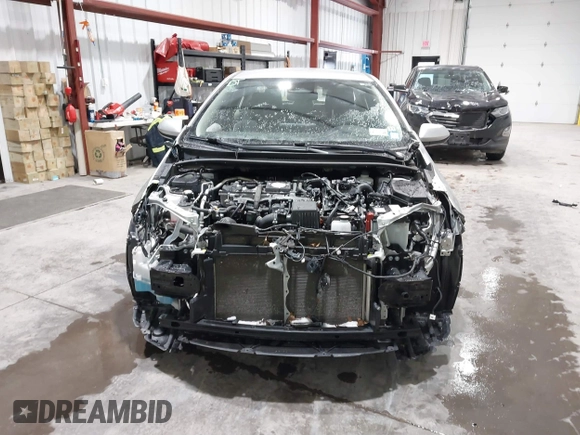 2023 Toyota Corolla Hybrid LE with VIN JTDBDMHE6P3003191, listed as a IAAI auction lot 41562160 with 86,206 mi miles. Bid and sale history available at carsss.com. Image 13.