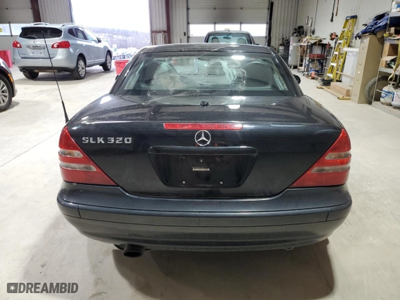2003 Mercedes-Benz SLK-Class 3.2L with VIN WDBKK65F23F277574, listed as a Copart auction lot 82523004 with 112,143 mi miles and Clean Title. Bid and sale history available at carsss.com. Image 6.