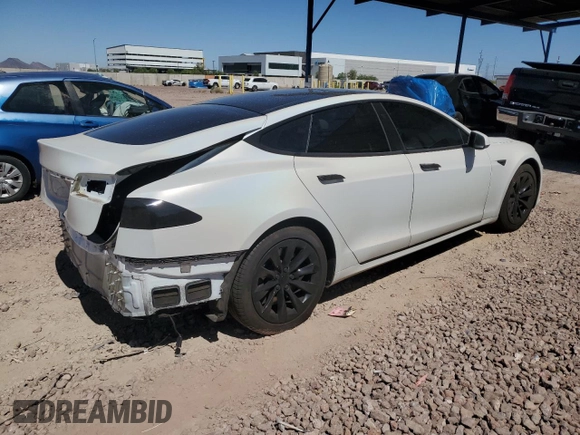 2017 Tesla Model S 60 with VIN 5YJSA1E13HF190581, listed as a Copart auction lot 57383595 with 88,219 mi miles and Salvage title. Bid and sale history available at DreamBid. Image 3.
