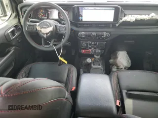 2024 Jeep Wrangler Rubicon X with VIN 1C4RJXFG2RW153197, listed as a Copart auction lot 76521384 with 3,897 mi miles and Salvage title. Bid and sale history available at DreamBid. Image 8.