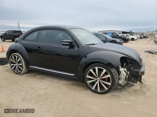 2012 Volkswagen Beetle 2.0T Turbo w/Sun/Sound with VIN 3VWV67ATXCM645050, listed as a Copart auction lot 45746555 with 152,935 mi miles and Salvage Title. Bid and sale history available at carsss.com. Image 4.