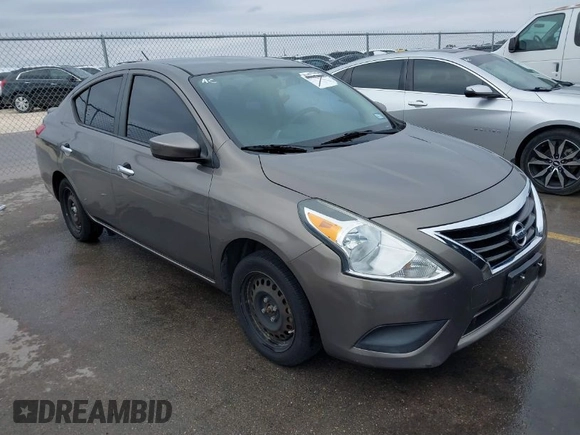 2015 Nissan Versa SV with VIN 3N1CN7APXFL936886, listed as a IAAI auction lot 41423608 with 126,598 mi miles. Bid and sale history available at carsss.com. Image 1.