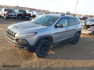 2015 Jeep Cherokee Trailhawk with VIN 1C4PJMBS2FW728961, listed as a IAAI auction lot 40712830 with 79,299 mi miles. Bid and sale history available at carsss.com. Image 17.