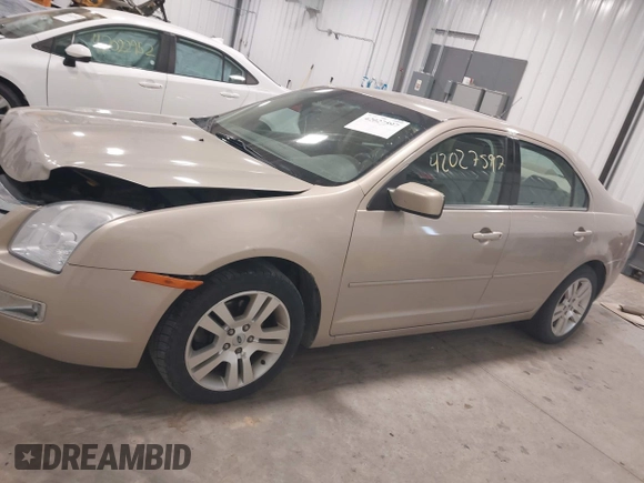 2007 Ford Fusion SEL with VIN 3FAHP02187R185614, listed as a IAAI auction lot 42027597 with 165,466 mi miles. Bid and sale history available at carsss.com. Image 14.