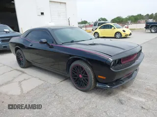 2012 Dodge Challenger SXT Plus with VIN 2C3CDYAG5CH268607, listed as a IAAI auction lot 41982122 with 188,091 mi miles. Bid and sale history available at carsss.com. Image 1.