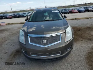 2014 Cadillac SRX Premium Collection z VIN 3GYFNDE37ES644966, wystawiony jako Copart lot #60501715 z przebiegiem 97 231 mil mil oraz Szkoda całkowita • Salvage title. Historia ofert i sprzedaży dostępna na DreamBid. Obrazek 5.