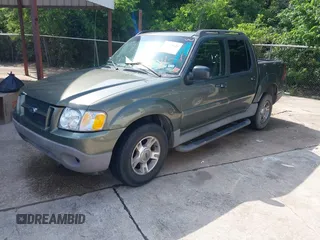 2003 Ford Explorer Sport Trac XLS z VIN 1FMZU67E93UB08190, wystawiony jako IAAI lot #42108621 z przebiegiem 233 972 mil mil oraz . Historia ofert i sprzedaży dostępna na DreamBid. Obrazek 2.