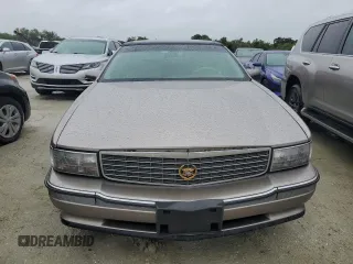 1995 Cadillac Concours z VIN 1G6KF52Y6SU244970, wystawiony jako Copart lot #75079524 z przebiegiem Nie podano mil oraz Szkody całkowita. Historia ofert i sprzedaży dostępna na DreamBid. Obrazek 5.