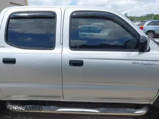 2003 Toyota Tacoma PreRunner z VIN 5TEGN92N23Z218412, wystawiony jako IAAI lot #41994813 z przebiegiem 334 799 mil mil oraz . Historia ofert i sprzedaży dostępna na DreamBid. Obrazek 13.