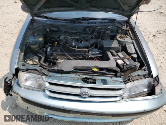 1994 Toyota Tercel DX z VIN JT2EL43T3R0489039, wystawiony jako Copart lot #67834034 z przebiegiem 139 726 mil mil oraz Szkoda całkowita • Salvage title. Historia ofert i sprzedaży dostępna na DreamBid. Obrazek 12.