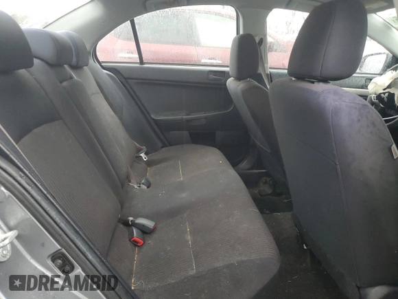 2014 Mitsubishi Lancer SE z VIN JA32V2FW8EU020237, wystawiony jako Copart lot #50333595 z przebiegiem 128 289 mil mil oraz Szkoda całkowita • Salvage title. Historia ofert i sprzedaży dostępna na DreamBid. Obrazek 10.