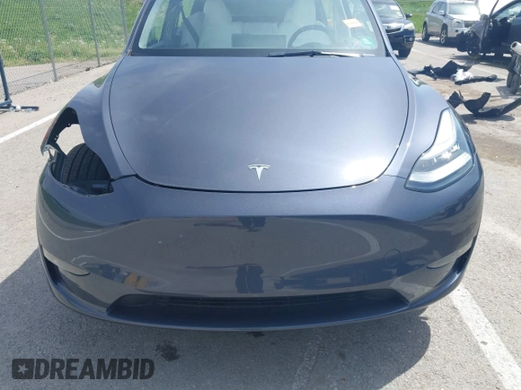 2023 Tesla Model Y Long Range z VIN 7SAYGDEE1PA158661, wystawiony jako IAAI lot #41983897 z przebiegiem 20 176 mil mil oraz . Historia ofert i sprzedaży dostępna na DreamBid. Obrazek 13.