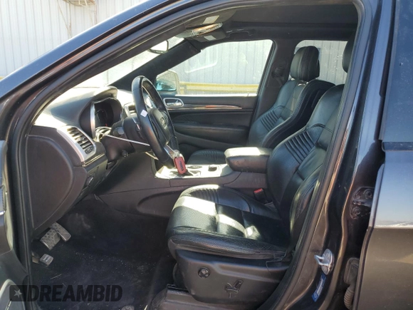 2018 Jeep Grand Cherokee Trackhawk with VIN 1C4RJFN96JC377074, listed as a Copart auction lot 53305975 with 27,625 mi miles and Salvage title. Bid and sale history available at DreamBid. Image 7.