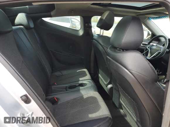 2013 Hyundai Veloster w/Black Int с VIN KMHTC6AD4DU139261, выставлен на аукционе Copart как лот 56175095 с пробегом 148 483 миль миль и Чистый • Clean title. История ставок и продаж доступна на DreamBid. Изображение 10.