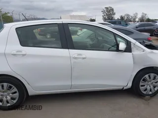 2013 Toyota Yaris L with VIN JTDKTUD38DD570483, listed as a IAAI auction lot 42071550 with 65,186 mi miles and . Bid and sale history available at DreamBid. Image 13.