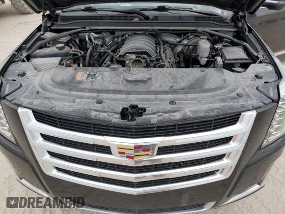 2018 Cadillac Escalade Luxury z VIN 1GYS3BKJ9JR198263, wystawiony jako Copart lot #81517084 z przebiegiem Nie podano mil oraz Szkody całkowita. Historia ofert i sprzedaży dostępna na DreamBid. Obrazek 12.