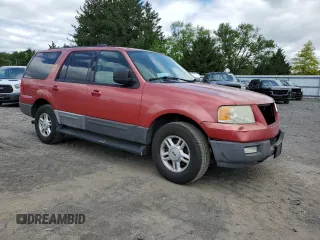 2003 Ford Expedition XLT Value with VIN 1FMPU16W83LC15726, listed as a Copart auction lot 57668695 with 276,085 mi miles and Salvage title. Bid and sale history available at DreamBid. Image 4.