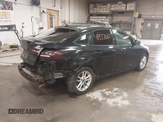 2015 Ford Focus SE with VIN 1FADP3F24FL285287, listed as a IAAI auction lot 41937687 with 130,460 mi miles. Bid and sale history available at carsss.com. Image 4.