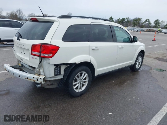 2013 Dodge Journey SXT with VIN 3C4PDCBG9DT564303, listed as a IAAI auction lot 41954764 with 132,125 mi miles. Bid and sale history available at carsss.com. Image 4.