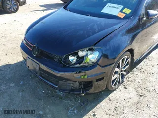 2014 Volkswagen GTI Driver's Edition with VIN WVWHD7AJXEW011230, listed as a IAAI auction lot 41600806 with 124,498 mi miles. Bid and sale history available at carsss.com. Image 6.