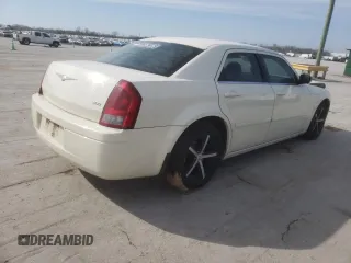 2005 Chrysler 300 with VIN 2C3JA43R25H663094, listed as a Copart auction lot 60813664 with 218,830 mi miles and Salvage Title. Bid and sale history available at carsss.com. Image 3.