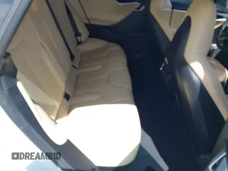 2013 Tesla Model S с VIN 5YJSA1AC8DFP10260, выставлен на аукционе IAAI как лот 42545156 с пробегом 121 329 миль миль и . История ставок и продаж доступна на DreamBid. Изображение 8.