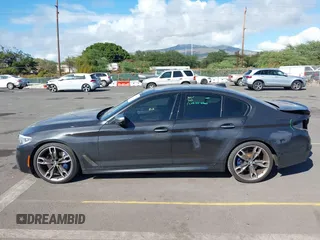 2018 BMW 5 Series M550i xDrive with VIN WBAJB9C51JB049513, listed as a IAAI auction lot 41146990 with 51,218 mi miles. Bid and sale history available at carsss.com. Image 15.