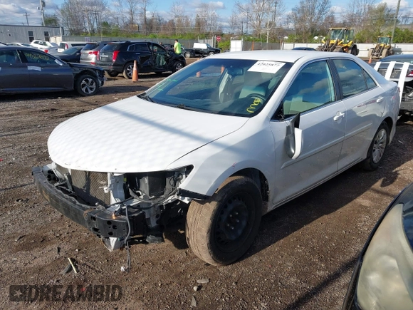 2014 Toyota Camry L with VIN 4T4BF1FK1ER424875, listed as a IAAI auction lot 42025877 with 113,919 mi miles. Bid and sale history available at carsss.com. Image 17.