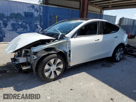 2024 Tesla Model Y Long Range with VIN 7SAYGDEEXRA288960, listed as a Copart auction lot 60801525 with 18,942 mi miles and Salvage title. Bid and sale history available at DreamBid. Image 1.