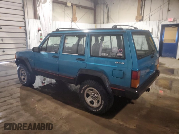 1994 Jeep Cherokee Sport with VIN 1J4FJ68S5RL109124, listed as a Copart auction lot 85524644 with 369,388 mi miles and Salvage title. Bid and sale history available at DreamBid. Image 2.