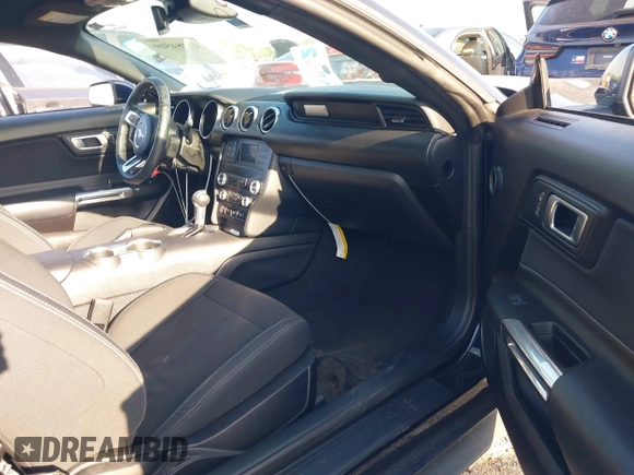 2021 Ford Mustang EcoBoost with VIN 1FA6P8TH0M5107683, listed as a IAAI auction lot 42084509 with 63,015 mi miles and . Bid and sale history available at DreamBid. Image 5.