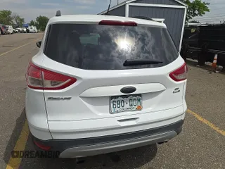2014 Ford Escape SE with VIN 1FMCU9G94EUD80272, listed as a IAAI auction lot 42737727 with 138,226 mi miles and . Bid and sale history available at DreamBid. Image 16.