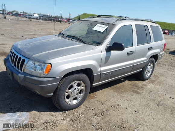 2001 Jeep Grand Cherokee Laredo with VIN 1J4GW48S61C662315, listed as a IAAI auction lot 42002235 with 166,901 mi miles. Bid and sale history available at carsss.com. Image 2.