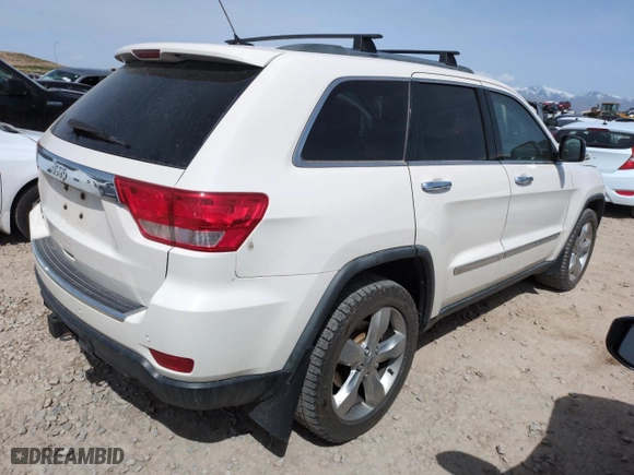 2012 Jeep Grand Cherokee Overland with VIN 1C4RJFCG9CC199486, listed as a Copart auction lot 51942135 with 113,098 mi miles and Salvage Title. Bid and sale history available at carsss.com. Image 3.