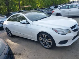 2015 Mercedes-Benz E-Class E 400 with VIN WDDKJ6FB5FF294900, listed as a IAAI auction lot 42067425 with 143,137 mi miles. Bid and sale history available at carsss.com. Image 13.