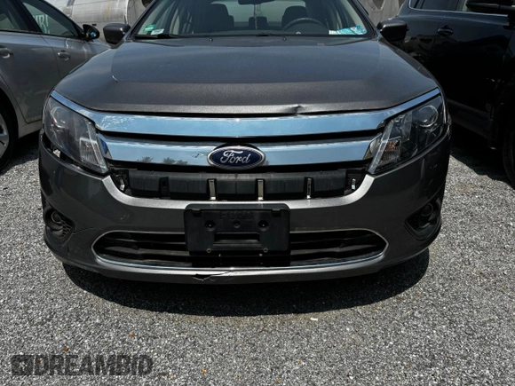 2010 Ford Fusion SE z VIN 3FAHP0HA5AR364515, wystawiony jako Copart lot #61060035 z przebiegiem Nie podano mil oraz Czysty tytuł • Clean title. Historia ofert i sprzedaży dostępna na DreamBid. Obrazek 7.