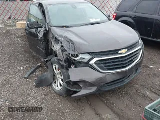 2020 Chevrolet Equinox LT z VIN 2GNAXJEV0L6181212, wystawiony jako IAAI lot #41202232 z przebiegiem 91 596 mil mil oraz . Historia ofert i sprzedaży dostępna na DreamBid. Obrazek 1.