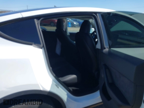 2023 Tesla Model Y Long Range with VIN 7SAYGDEE3PA201719, listed as a IAAI auction lot 42048816 with Not Provided miles and . Bid and sale history available at DreamBid. Image 8.