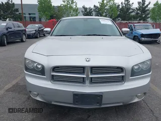 2010 Dodge Charger SXT with VIN 2B3CA3CVXAH307483, listed as a IAAI auction lot 42005739 with 165,844 mi miles and . Bid and sale history available at carsss.com. Image 6.