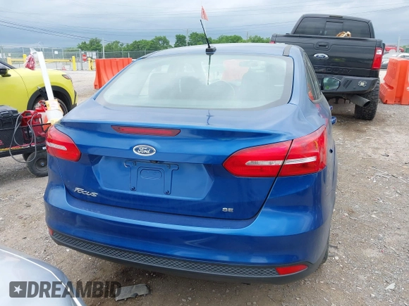 2018 Ford Focus SE z VIN 1FADP3F21JL212029, wystawiony jako IAAI lot #42258350 z przebiegiem 91 939 mil mil oraz . Historia ofert i sprzedaży dostępna na DreamBid. Obrazek 16.
